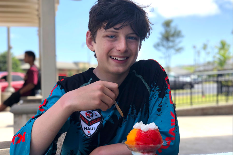 Enjoying shaved ice after mountain biking in Maui