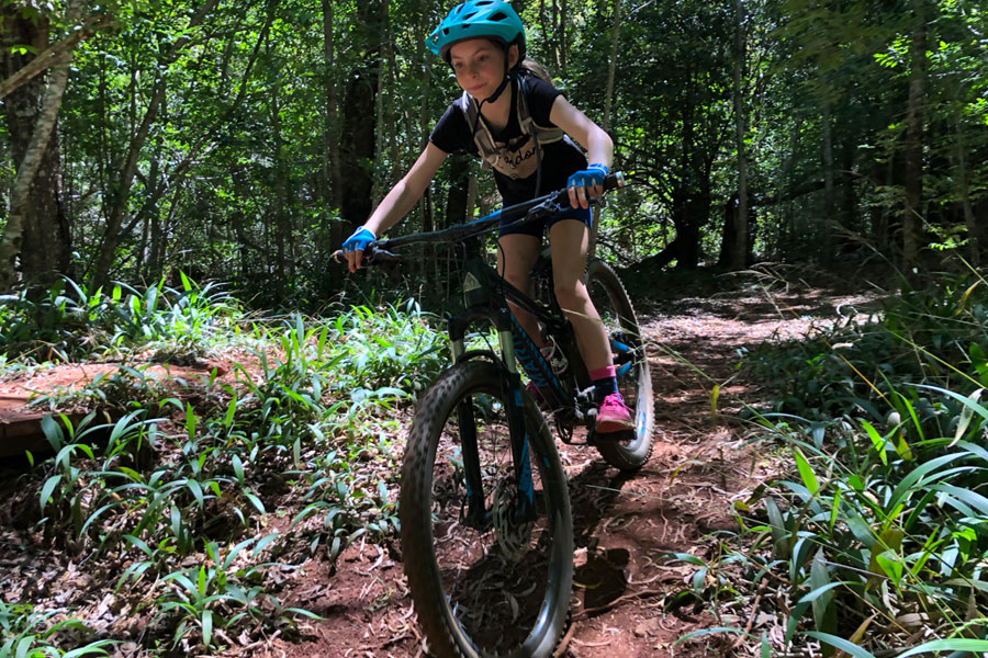 Shredding mountain bike trails in Maui