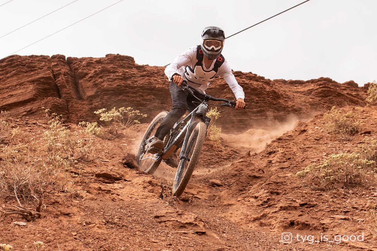 Mountain biking down loose terrain in the Utah desert