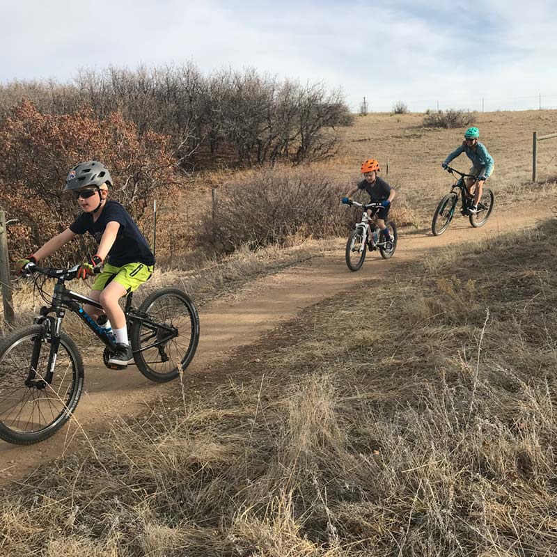 Julie and her kids mountain biking