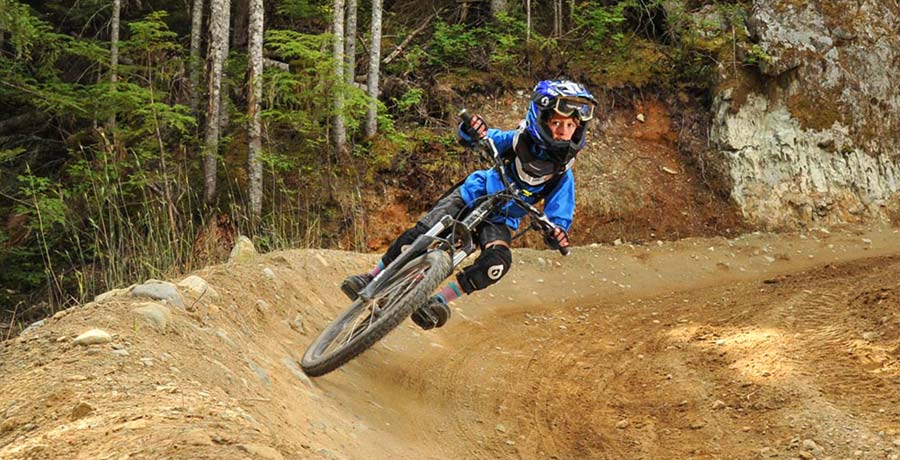 Kid riding EZ Does It in the Whistler Bike Park