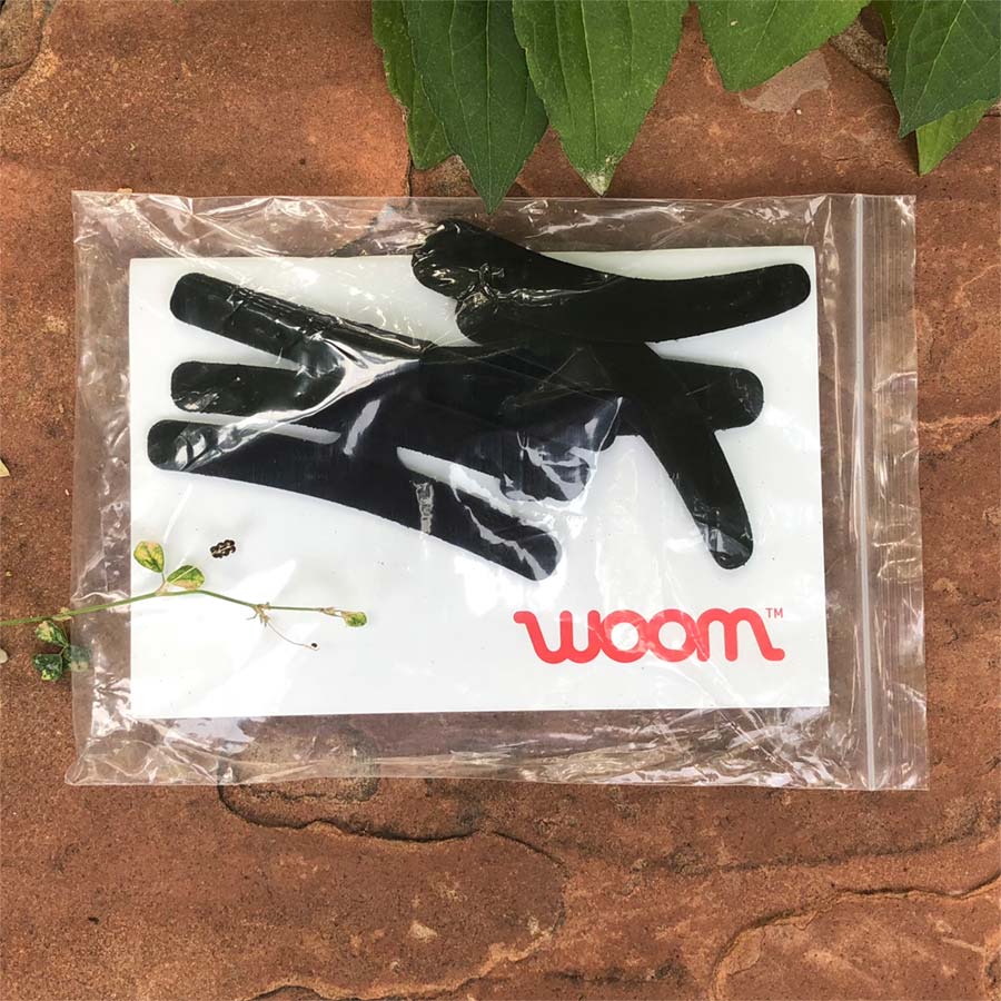 Extra bumper pads are included with the Woom Kids Bike Helmet