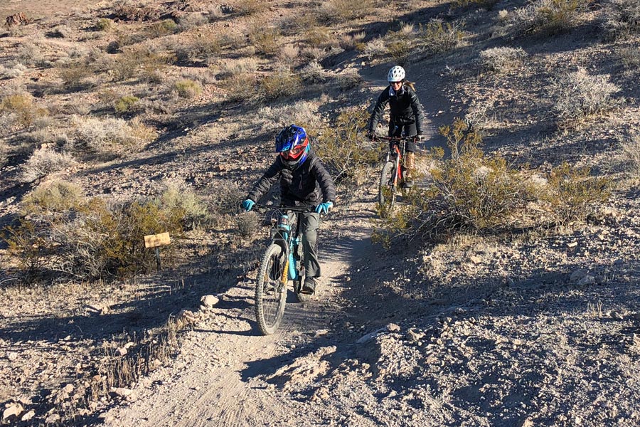 Mother and son riding Inner Caldera trail at Bootleg Canyon MTB park