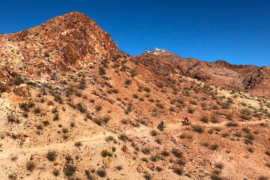 Mom rides Bootleg Mountain Bike Park with young son