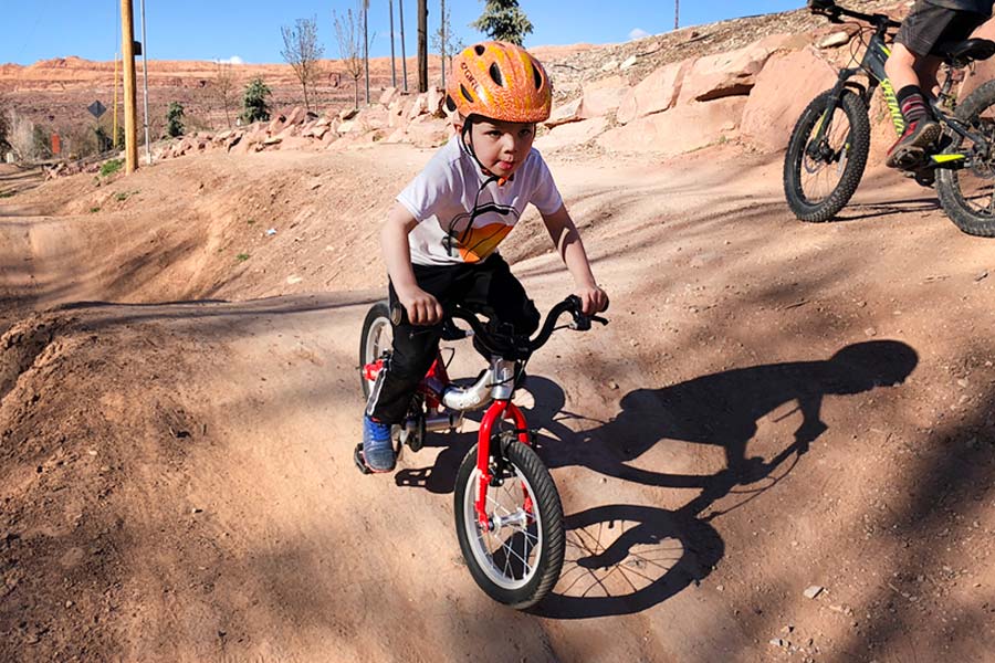 riding bike standing up