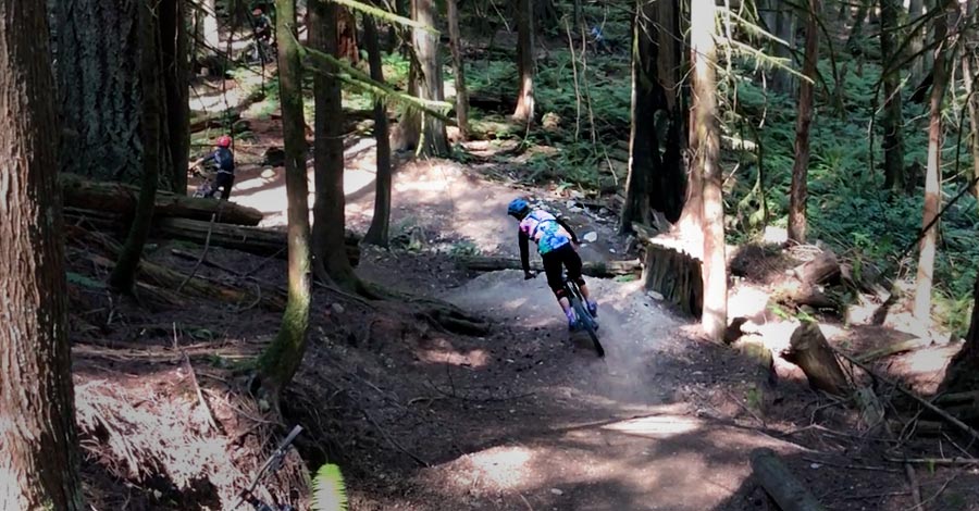 Sprockids MTB Park - descending a trail with mtb kids