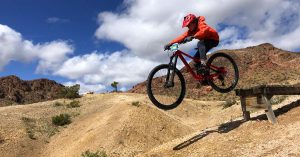 Our rider gets the Norco Sight 27.5 off a drop and in the air