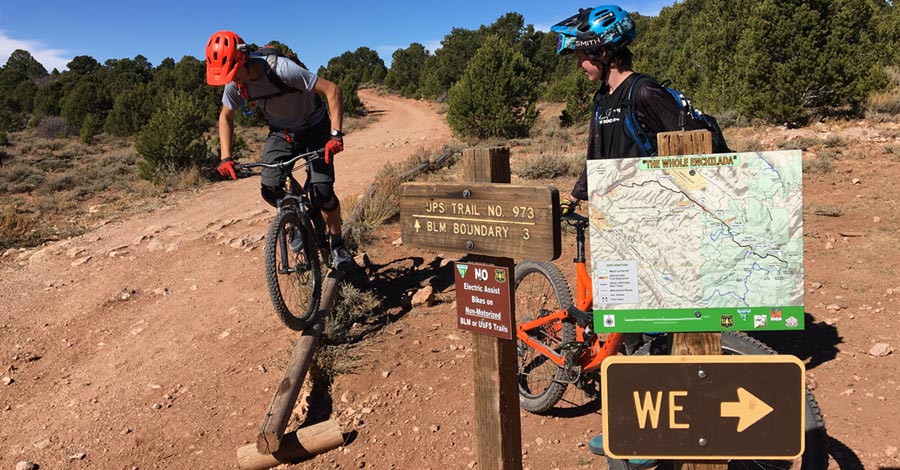 Horsing around at a trail junction on the Whole Enchilada mtb trail - Moab