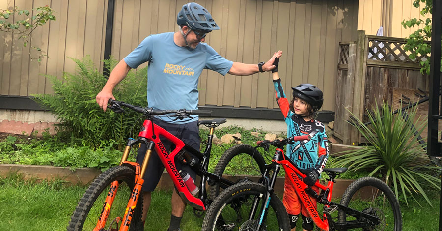 Father and son high-five