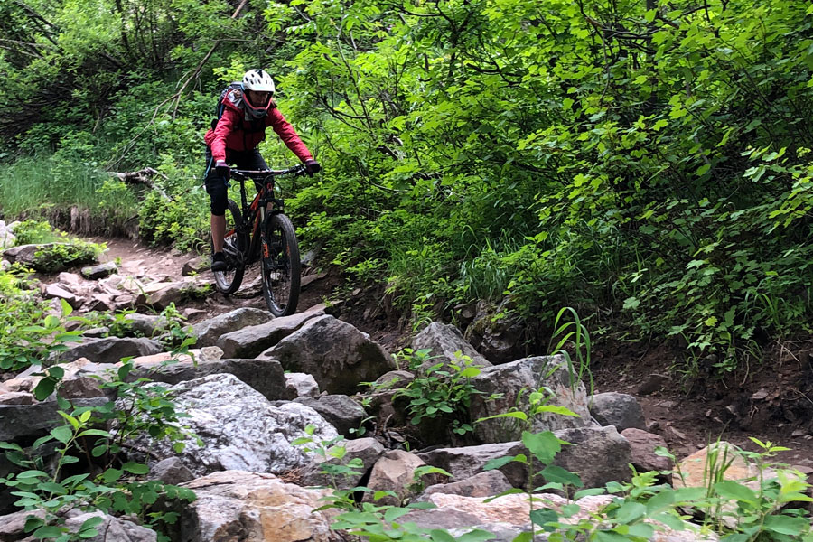 Mom takes on a technical section of the Teton Pass