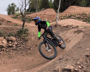 Rolling out on a dirt jump line - Woodward Park City