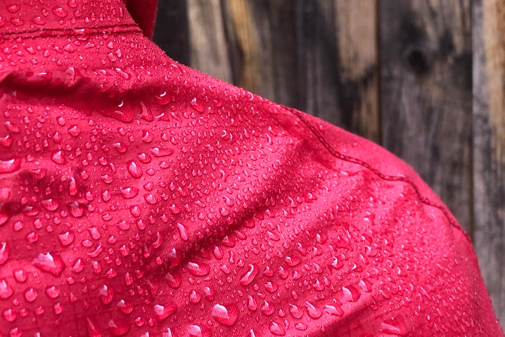 Water beading upon the Bontrager Avert Women's Stormshell MTB rain jacket