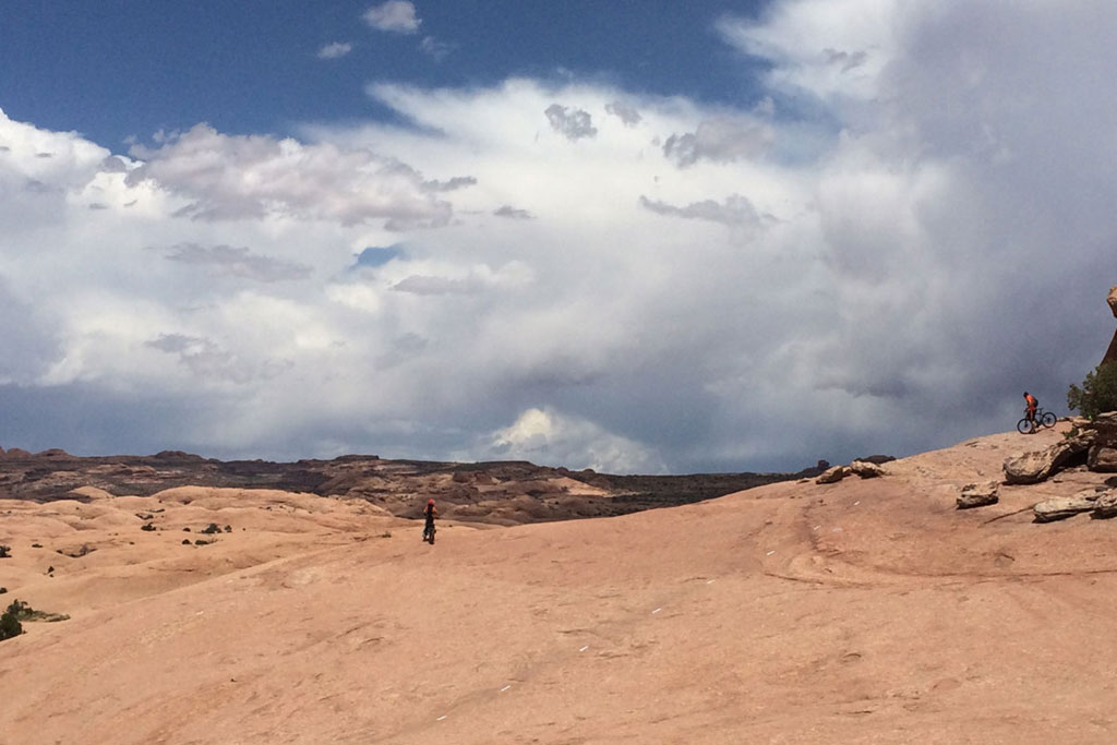 Landscapes are big while mountain biking in Moab, Utah